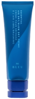 Blue tube of 'Essential Air Dry Blow Dry Crème' by BLEU on a white background